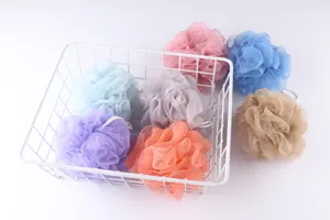Colorful mesh bath sponge set with wire storage basket for daily shower and gentle body cleaning.