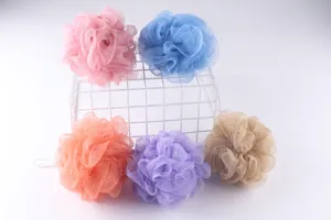 Soft mesh bath sponge detail, colorful shower puff set with foam net for daily body cleaning.