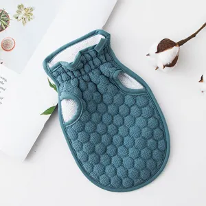 Solid color honeycomb exfoliating bath glove with open fingers for easy body cleaning and soft massage.