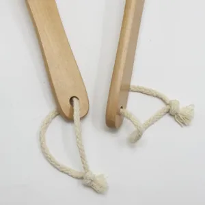 Wooden bath brush handle with hanging rope detail, natural wood body for body scrubbing.