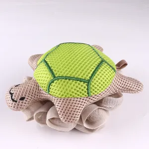 Cute turtle shape mesh bath sponge detail, soft exfoliating body scrubber loofah close-up