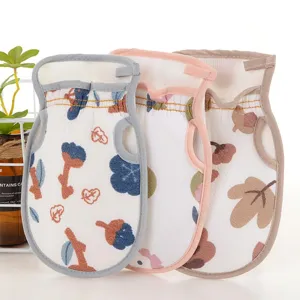 Detailed shot of printed exfoliating bath mitts with colorful borders, soft texture.
