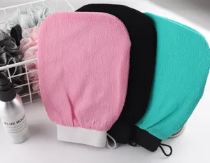Detailed view of colorful exfoliating bath gloves with elastic cuffs and hanging loops.