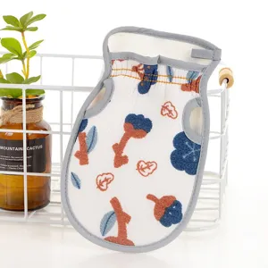 Exfoliating bath mitt with cute floral print, double-sided shower glove for body cleaning.