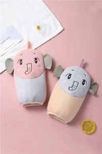 Close-up detail of cute cartoon elephant children bath gloves, dual-side scrubber for skin cleaning.