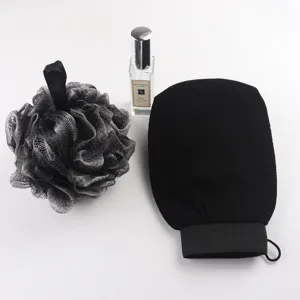 Black mesh bath puff and exfoliating bath glove set for daily body scrubbing and spa care.