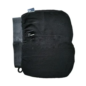 Detailed view of a black exfoliating bath mitt with elastic grey wristband and logo tag.