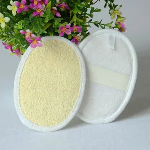 Natural loofah bath scrub pad with elastic hand strap, exfoliating body scrubber for shower.