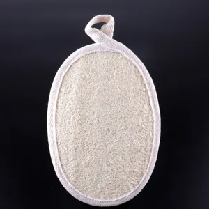 Natural plant loofah bath sponge pad with beige fabric border and hanging loop detail.