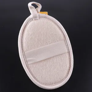 Natural loofah bath sponge detail view, beige edged scrubbing pad with elastic strap and loop.