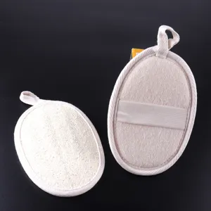 Natural loofah bath sponge exfoliating body scrubber with beige edge and hand strap.