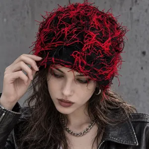 Trendy black and red knitted beanie hat, cozy and stylish acrylic skull cap for winter.