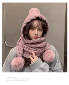 Pink knitted one-piece hat scarf for women, thick warm winter beanie with cute plush pom poms.
