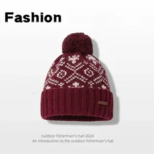 Winter women's pom pom knit beanie with traditional Fair Isle pattern, warm woolen hat.