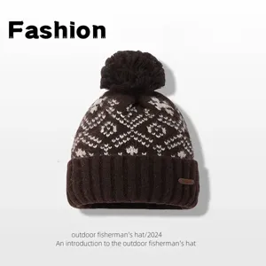Winter warm thick knit pom-pom beanie with classic fair isle pattern and soft wool texture.
