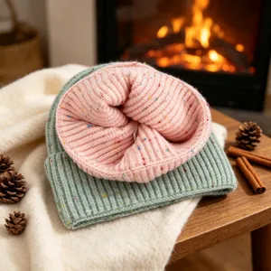 Cozy winter knit beanie with colorful flecks, thick double layer design, warm and stylish apparel.