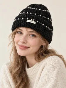 Korean style warm thick knit beanie for women, black winter pullover hat with cute white dot patterns.