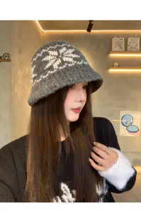 Cozy grey and white Fair Isle knit bucket hat detail, winter warm wool basin cap style.