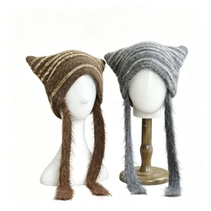 Autumn and winter cat ear knitted hat with stripes, long tassels, and warm earflaps.