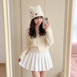 Sweet cat ear knit hat for women, cute winter warm wool cap with buttons, soft daily wear accessory.