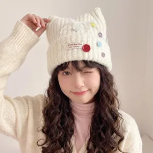 Detailed view of the cute cat ear knitted beanie for women, autumn winter warm hat.