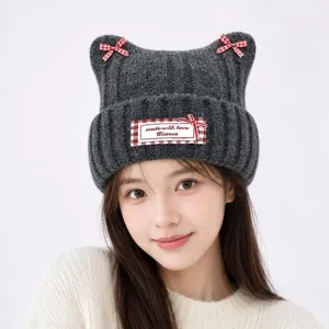Cute cat ear knitted beanie hat with red plaid bows, warm winter woolen cap for women and girls.