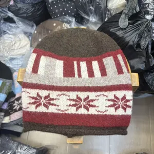 Winter jacquard knit beanie hat, warm thick wool cap with geometric snowflake pattern.