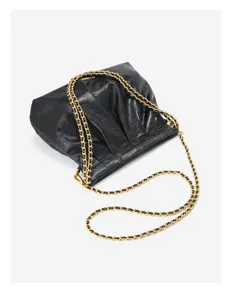 Detail view of black crinkled leather hobo shoulder bag with luxury chain strap.