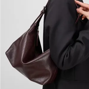 Genuine leather hobo shoulder bag for women, large capacity underarm tote bag in dark brown.