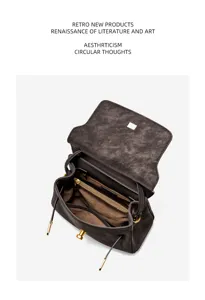 Detailed view of retro brown leather Kelly handbag interior compartment and metal lock.