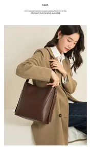 Genuine leather bucket bag, chic daily shoulder bag for women, stylish and spacious design.