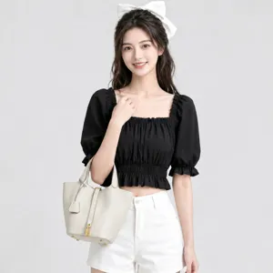 Elegant genuine leather bucket bag for women, versatile top handle commuter tote handbag.