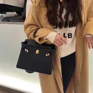 Zwarte lederen handtas in Kelly stijl voor dames, luxe handtas, elegante schoudertas voor werk.