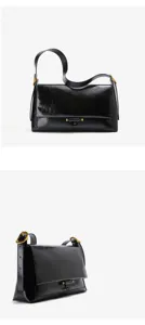 Black leather shoulder bag for women, classic vintage commuter messenger bag detail.