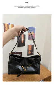 Black leather shoulder bag for women, vintage hobo purse with metal buckle and stylish strap.