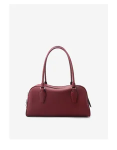Minimalist genuine leather shoulder bag, chic bowling style handbag for women daily commute.