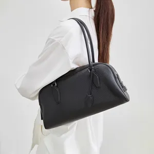 Genuine leather Boston shoulder bag for women, stylish minimalist black underarm bag.