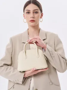 Sac à main femme en cuir gaufré croco beige sac bandoulière bowling poignée supérieure