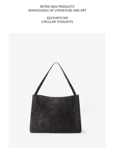 Detail view of premium genuine leather retro shoulder bag, elegant vintage underarm handbag.