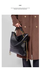 Black leather tote bag with gold chain straps, large capacity casual shoulder bag.