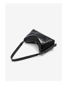 Black leather hobo bag shoulder detail showing smooth genuine leather texture and hardware.