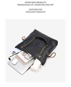 Black genuine leather tote bag for women, large capacity quilted chain shoulder handbag.