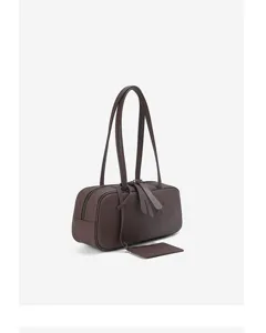 Classic brown leather boston shoulder bag detail, stylish vintage underarm pillow handbag.