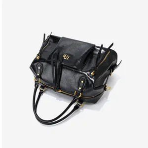 Black leather Boston motorcycle bag with tassels, large capacity commuter handbag for women.