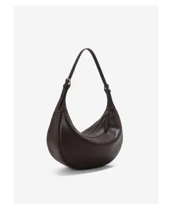 Detailed view of the dark brown crescent hobo shoulder bag showing smooth leather texture and zipper.