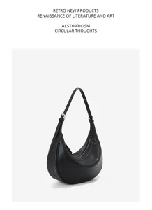 Detailed view of the black crescent hobo shoulder bag, showing premium leather texture and hardware.