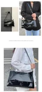 Black genuine leather shoulder bag detail, stylish commuter messenger bag with metal lock.