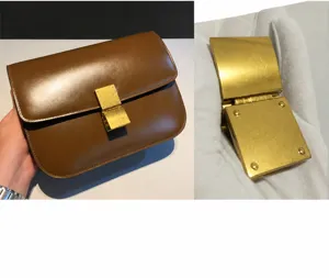 Classic leather box shoulder bag with vintage metal hardware, stylish and elegant daily wear.