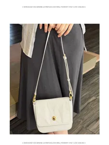 White genuine leather shoulder bag with textured wrinkles and elegant gold lock detail.