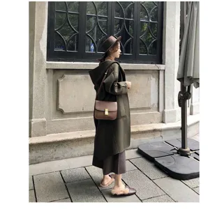 Brown genuine leather crossbody box bag, elegant shoulder bag for women daily commuting style.